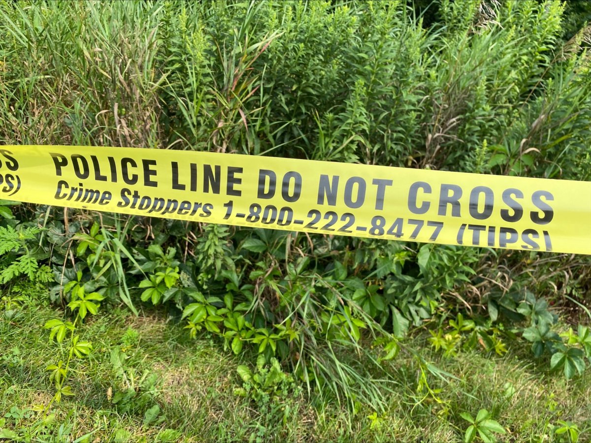 A file photo of police tape in a park.