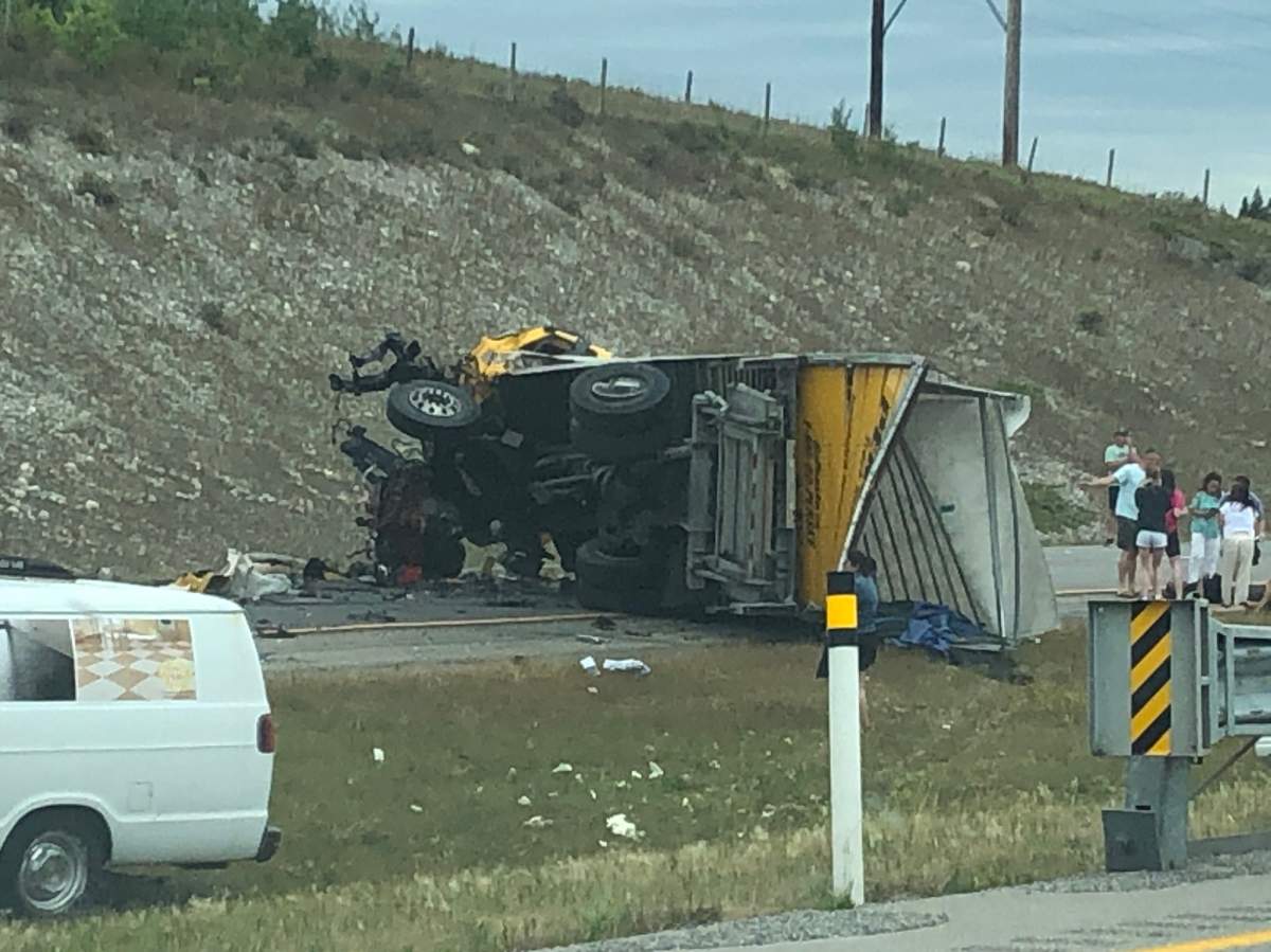 A semi and a five-tonne truck crashed on Highway 1 near Morley, Alta. on Wednesday, August 11.