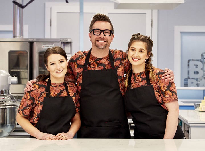 Jared Bugyi, owner of Queen City Cakes, is pictured on the set of 'The Big Bake: Halloween' with his teammates Annissa Cheyne (left) and Megan Degelman (right).
