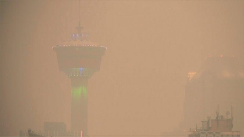 Smoke obscures the sight of the Calgary Tower on Monday, Aug. 16, 2021.