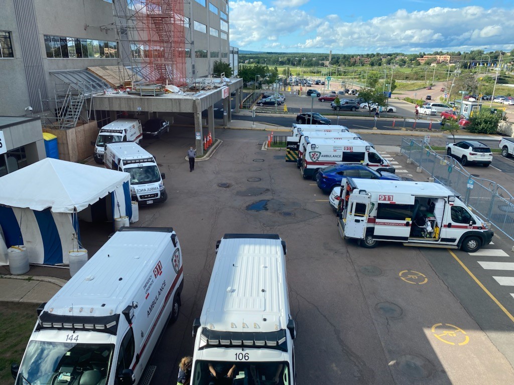At least eight ambulances were waiting outside the Dr. Georges-L.-Dumont University Hospital Centre on Tuesday, Aug. 24.