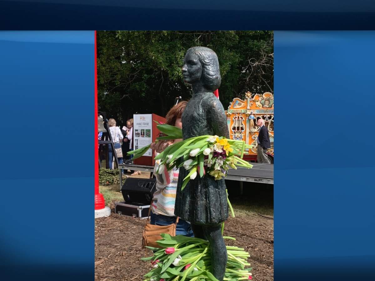 A statue of Anne Frank is unveiled in Light Horse Park August 8, 2021. 