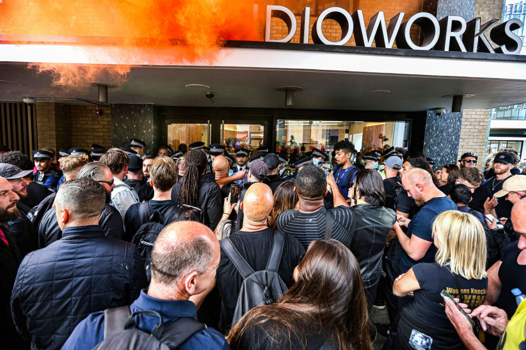 Protesters gather outside Studioworks as they take part in a demonstration in London, U.K., on Aug, 9, 2021.
