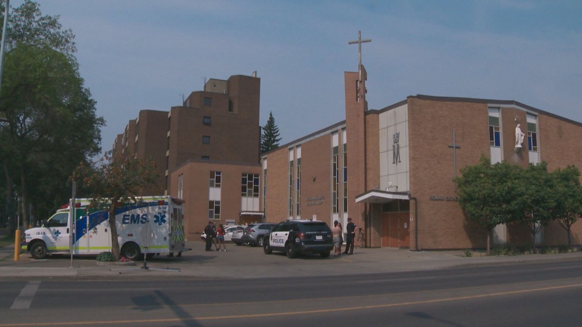 A woman says she was hurt during a demonstration outside an Edmonton Catholic church August 15, 2021.