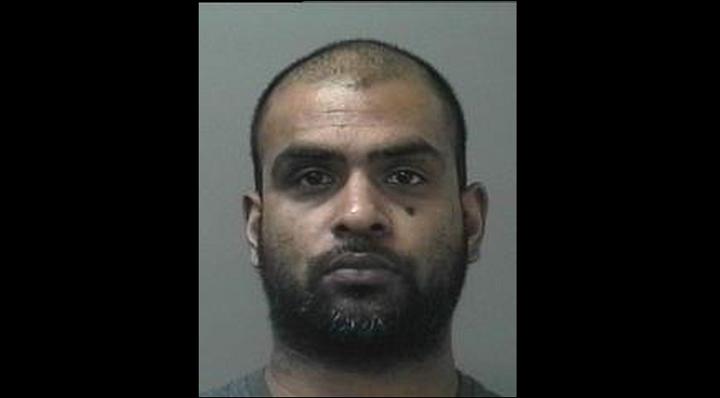 Police say Dennis Singh was arrested Tuesday.