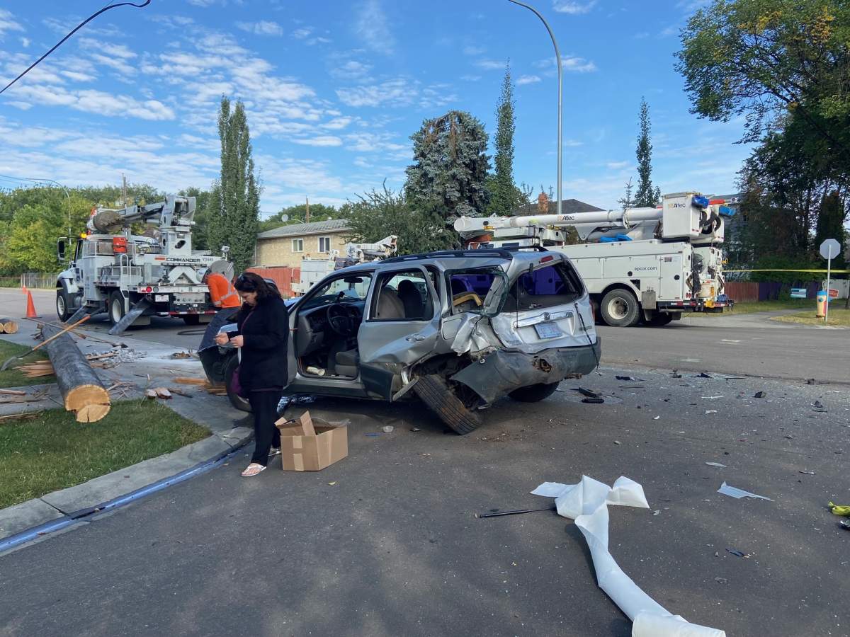 Edmonton police investigate a collision in the area of 115 Avenue and 87 Street Thursday, Aug. 26, 2021.