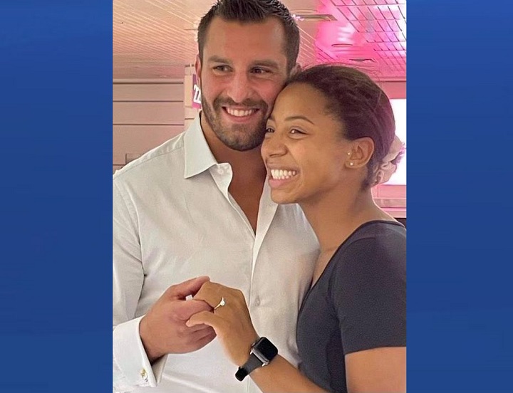 Jennifer Abel is seen with her fiancé David Lemieux after he proposed at Trudeau International Airport on Monday, Aug. 3, 2021.