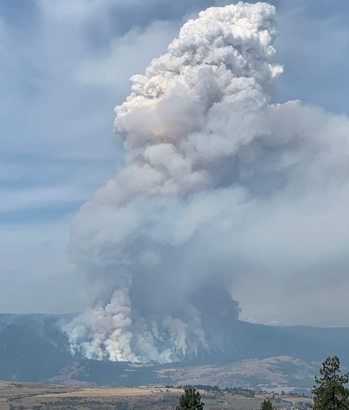 Marco Longley sent in this incredible photo from his friends Liz and John of the smoke from the White Rock Lake fire above Swan Lake.
