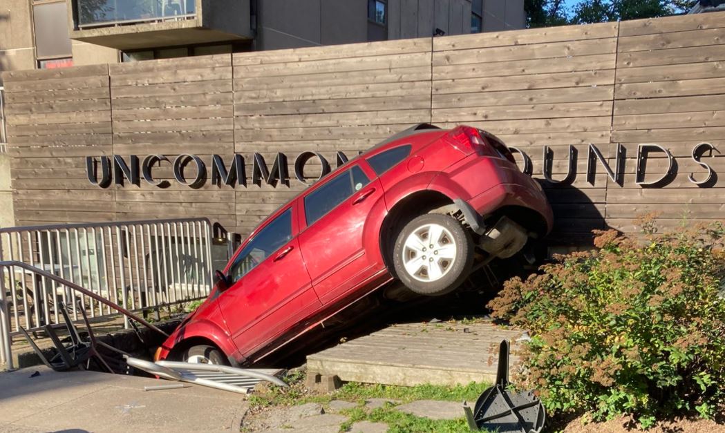 A vehicle narrowly missed crashing into the front door of a Halifax coffee shop on Sunday morning. 