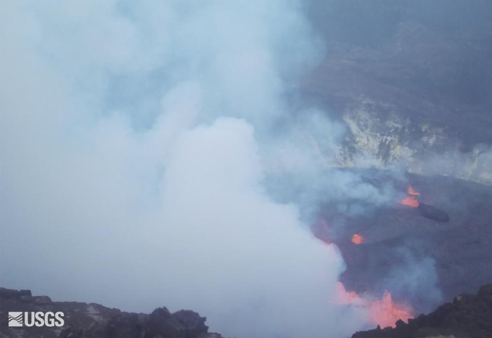 This webcam image provided by the United States Geological Survey shows a view of an eruption that has begun in the Halemaumau crater at the summit of Hawaii’s Kilauea volcano, Wednesday, Sept. 29, 2021. (USGS via AP).
