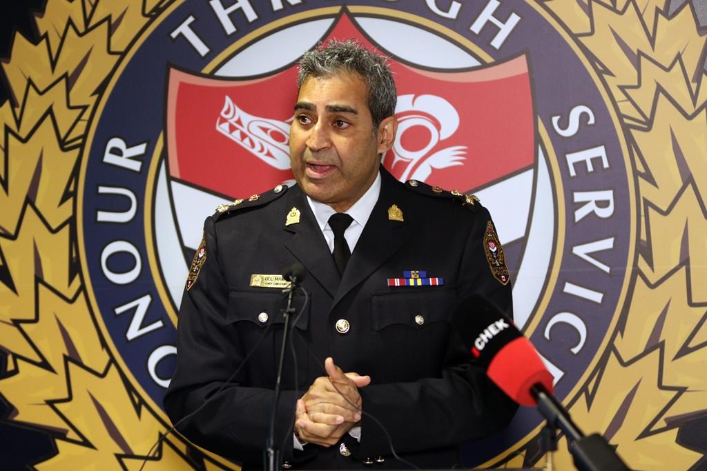 Victoria Police Chief Constable Del Manak speaks during a press conference at the Victoria Police Headquarters in Victoria, B.C., on Wednesday, March 24, 2021. Five people were arrested after the chief of the Victoria Police Department had liquid poured on him while attending a ceremony for an Indigenous woman killed during a wellness check. THE CANADIAN PRESS/Chad Hipolito.