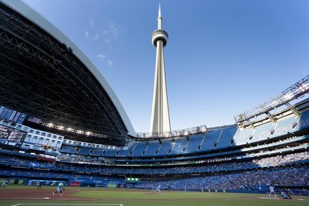 Toronto Blue Jays starting pitcher Ross Stripling (48) throws the opening pitch of the Toronto Blue Jays first home game of the 2021 season at the Rogers Centre in Toronto against the Kansas City Royals during MLB action on Friday, July 30, 2021. THE CANADIAN PRESS/Peter Power.