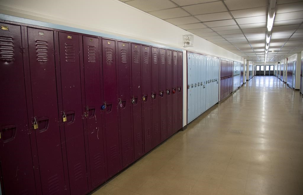 Photo of an empty school hallway.