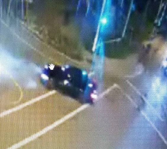 Surrey RCMP are looking for the driver of a black sedan after shots were fired at a frontline officer Friday night. Photo provided by Surrey RCMP.