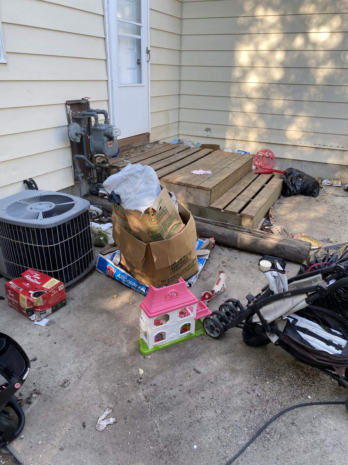 The homeowner says her rental property had been trashed both inside and outside the home.