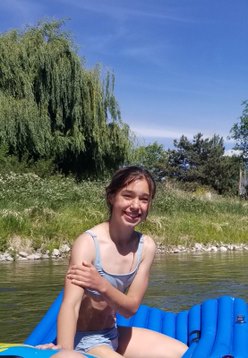 Joseph’s 11-year-old daughter Avery clutching her sore arm after her COVID-19 shot.