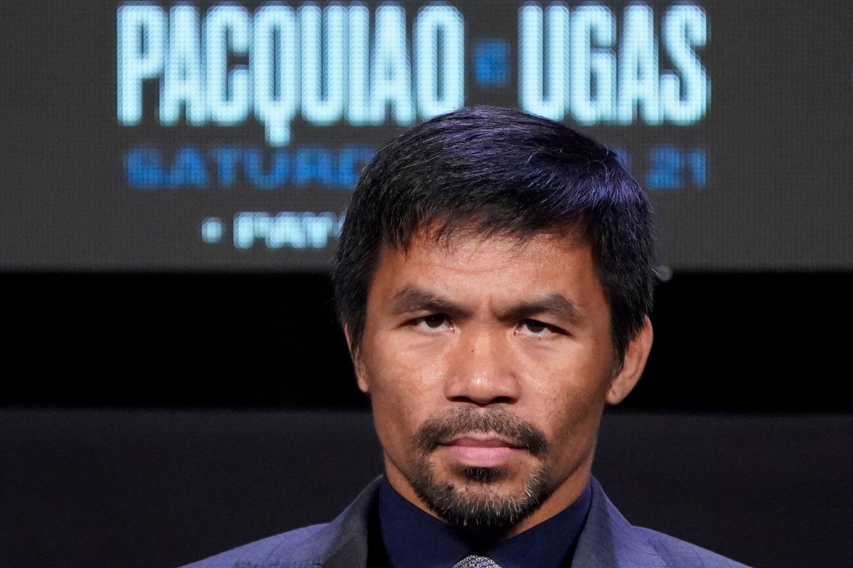 Manny Pacquiao, of the Philippines, attends a news conference Wednesday, Aug. 18, 2021, in Las Vegas. Pacquiao is scheduled to fight Yordenis Ugas, of Cuba, in a welterweight championship bout Saturday in Las Vegas. (AP Photo/John Locher).