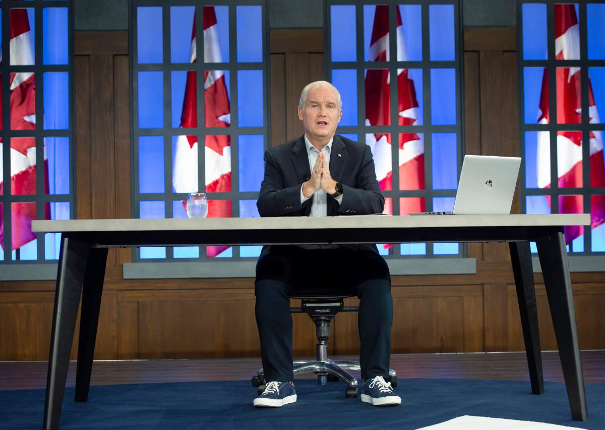 Conservative Leader Erin O'Toole takes part in a virtual telephone town hall meeting with voters in Nova Scotia from the party's studio Thursday, August 26, 2021 in Ottawa.Canadians will vote in a federal election Sept. 20th.