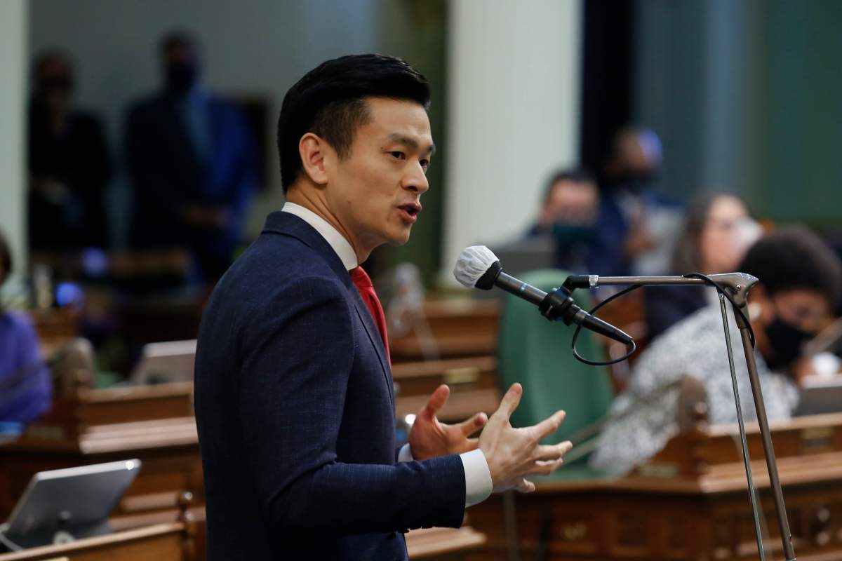 FILE - In this June 10, 2020 file photo Democratic Assemblyman Evan Low speaks on the floor of the Assembly at the Capitol in Sacramento, Calif.