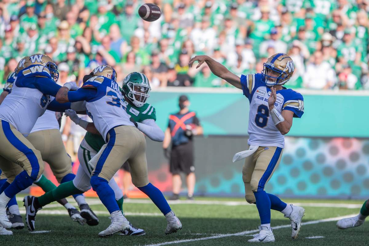Winnipeg Blue Bombers quarterback Zach Collaros (8) throws the ball during first half CFL football action against the Saskatchewan Roughriders, in Regina, Sunday, Sept. 5, 2021.