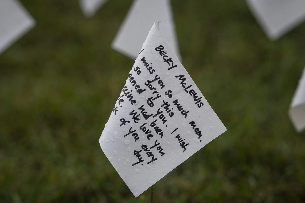 A message of memorial is written on one of the 660,000 white flags, representing the number of US lives lost to Covid-19, on the National Mall in Washington, DC, USA, Thursday, September 16, 2021. The project, by artist Suzanne Brennan Firstenberg, titled ‘In America: Remember’, will be on display September 17, 2021 through October 3, 2021. Photo by Rod Lamkey/CNP/ABACAPRESS.COM