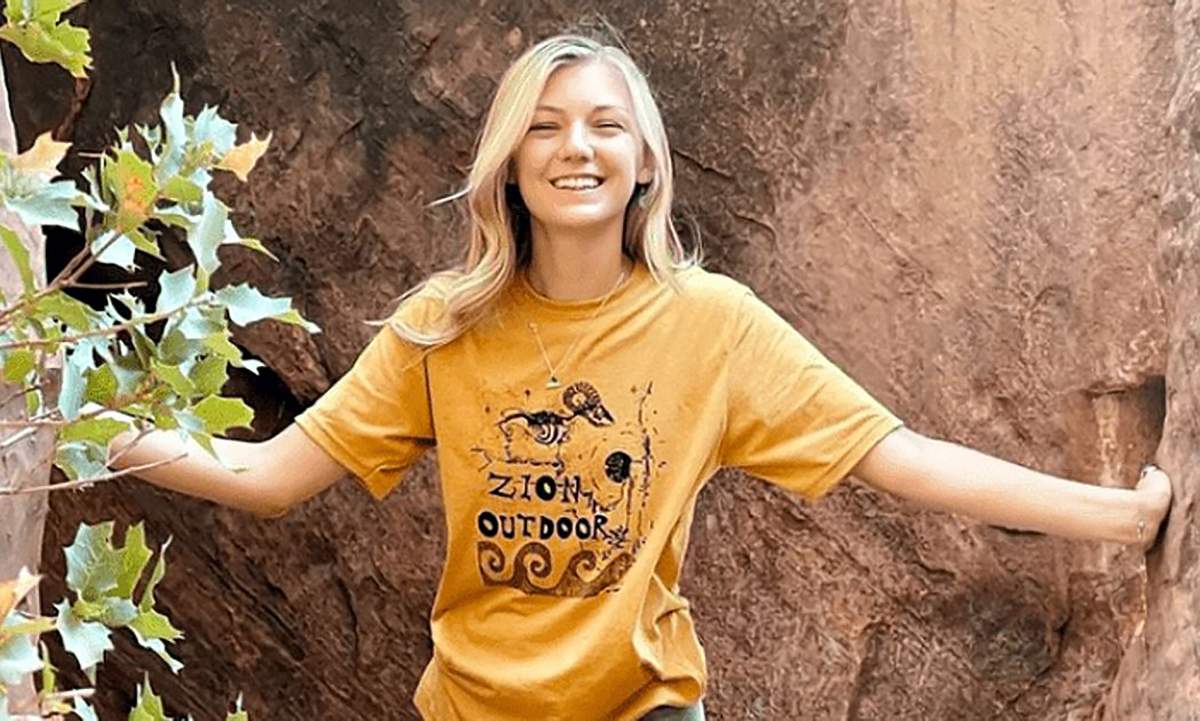 A photo of Gabby Petito in a yellow shirt, arms outstretched, included in a Facebook about her disappearance by the North Port Police Department in Florida, the lead agency in the missing person case.