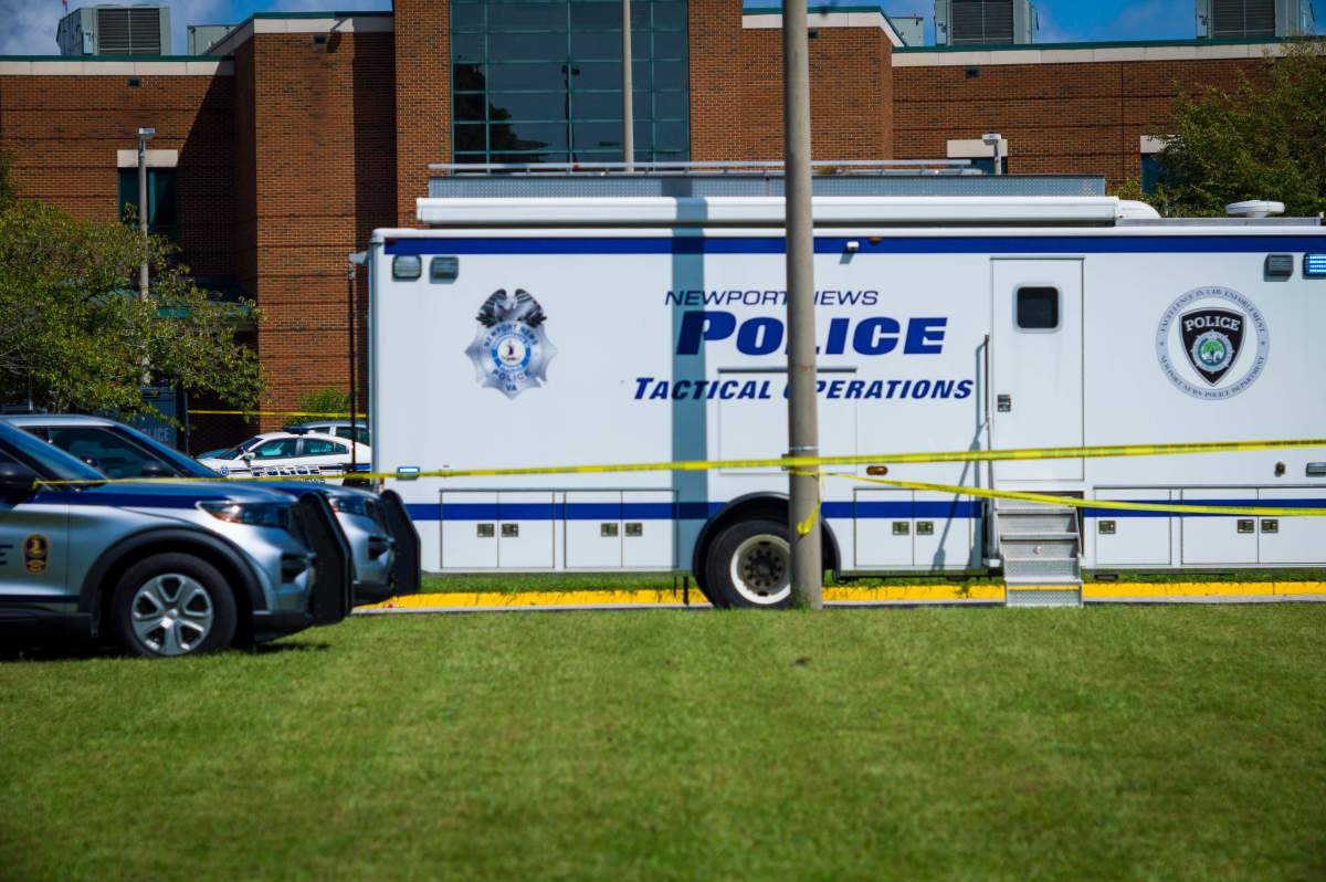 Police respond to the scene of a shooting at Heritage High School in Newport News, Va., on Sept. 20, 2021.