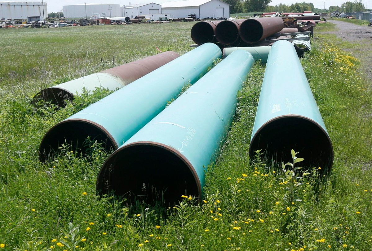 FILE - In this June 29, 2018, file photo, pipeline used to carry crude oil is shown at the Superior terminal of Enbridge Energy in Superior, Wis. 