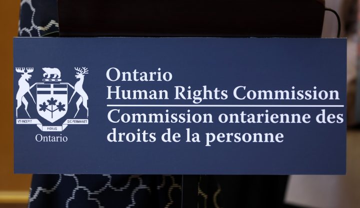 A sign of the Ontario Human Rights Commission is seen at a news conference in Vaughan, Ont., on Friday, Sept. 20, 2019.