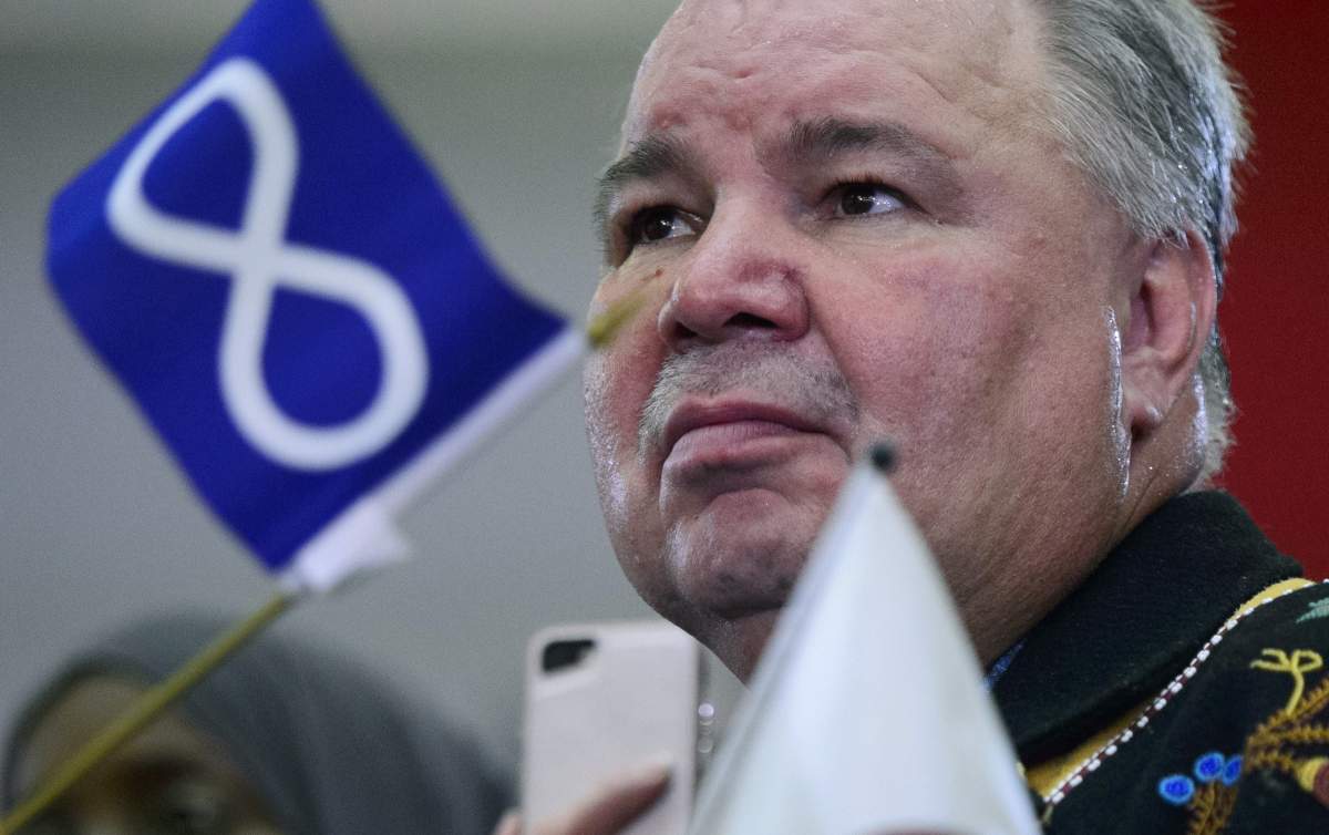David Chartrand, president of the Manitoba Metis Federation watches on as Liberal Leader Justin Trudeau holds a rally in Winnipeg, Saturday, Oct. 19, 2019. On the eve of First Ministers' meetings with national Indigenous leaders, the vice-president of the Metis National Council is stepping up his rhetoric against three provincial Metis leaders, accusing them of striking a "backroom deal" that allows new members into the nation he believes are not Metis. 