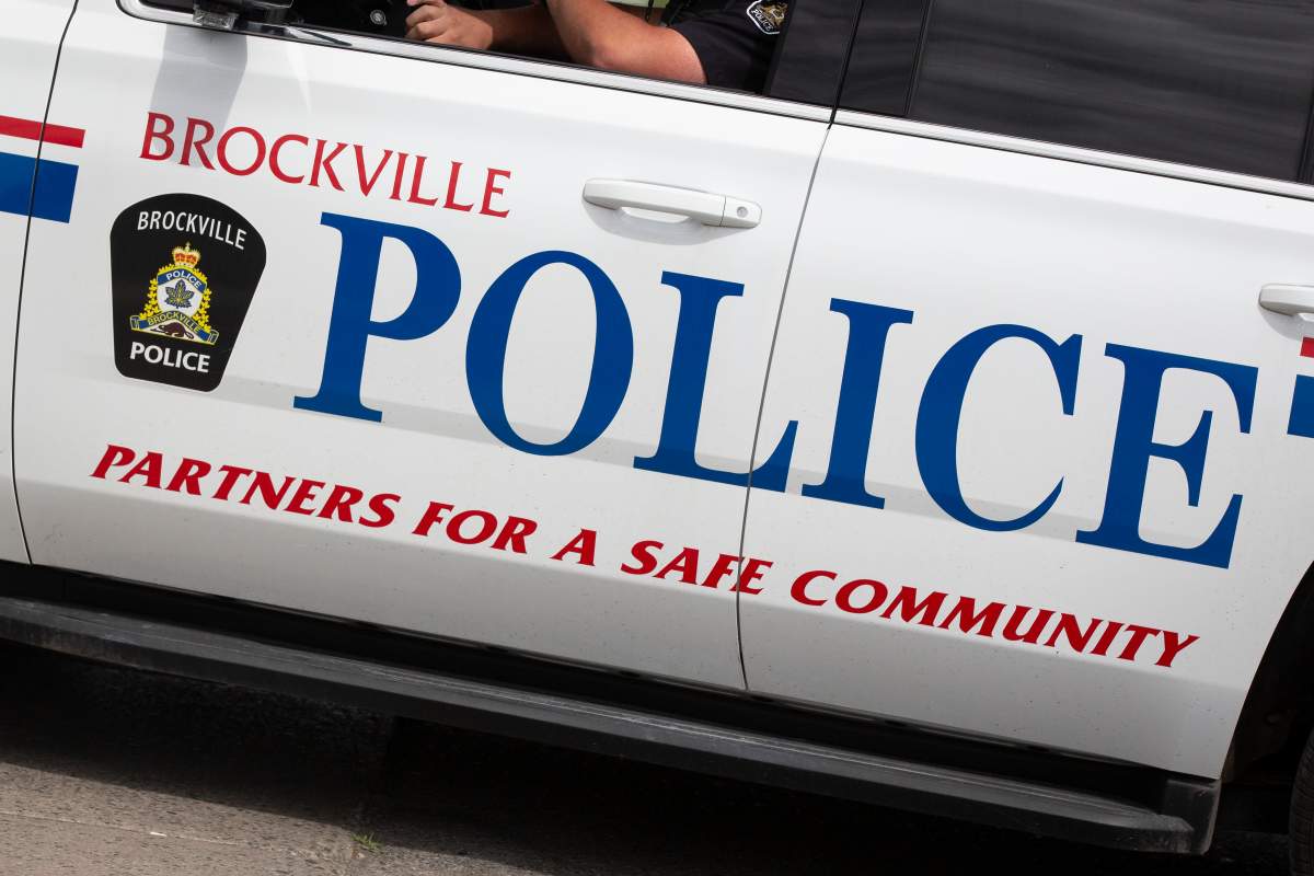 Brockville police allege a man charged with threatening people outside an ice cream shop began 'urinating and throwing feces' after his arrest Thursday.