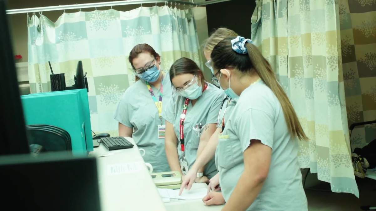 Staff in the emergency department of the Royal Alexandra Hospital in Edmonton, Alta. in September 2021.
