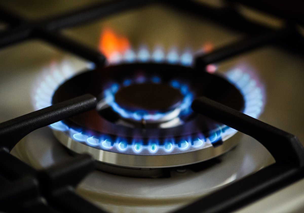 Natural gas burning on kitchen gas stove.