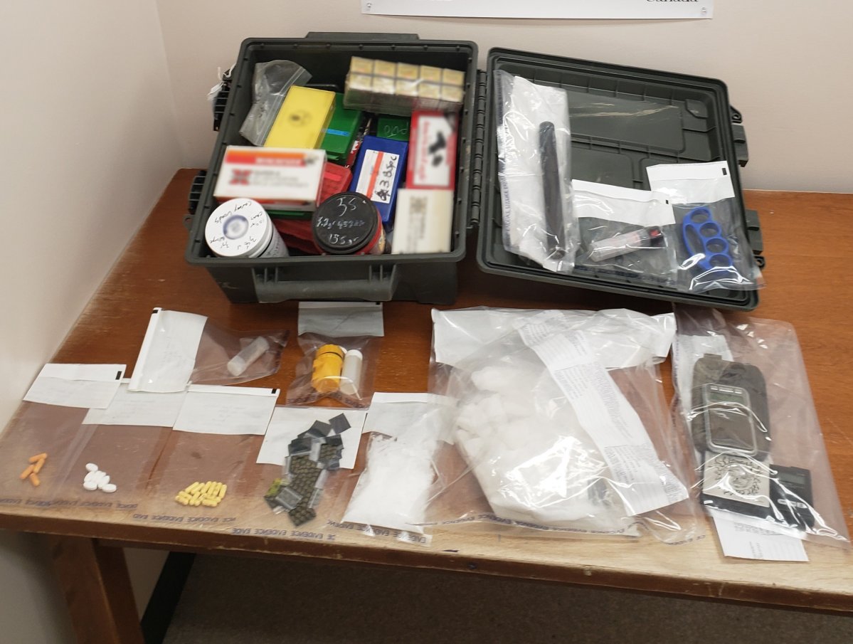 This photo provided by RCMP shows items that were seized during a vehicle search on Sept. 14 in the town of Bruno, Sask., including drugs and weapons.