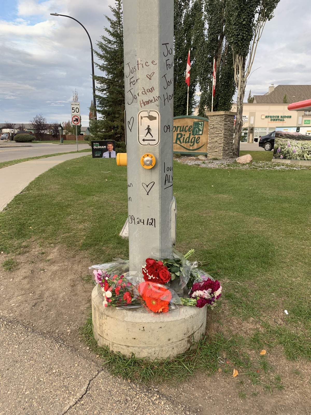 A memorial at the intersection of Spruce Ridge Road and Jennifer Heil Way in Spruce Grove, where Jordan Hamelin was fatally hit on Friday, Sept. 24, 2021.