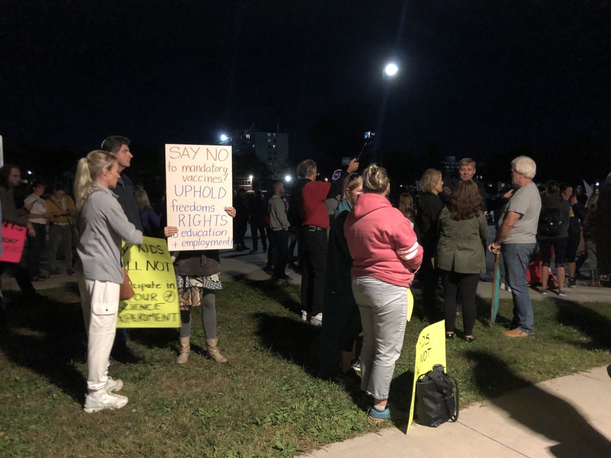 Around 70 to 75 people protesting vaccines were seen outside Louise Arbour French Immersion elementary school in London Ont. on Sept 28, 2021
.