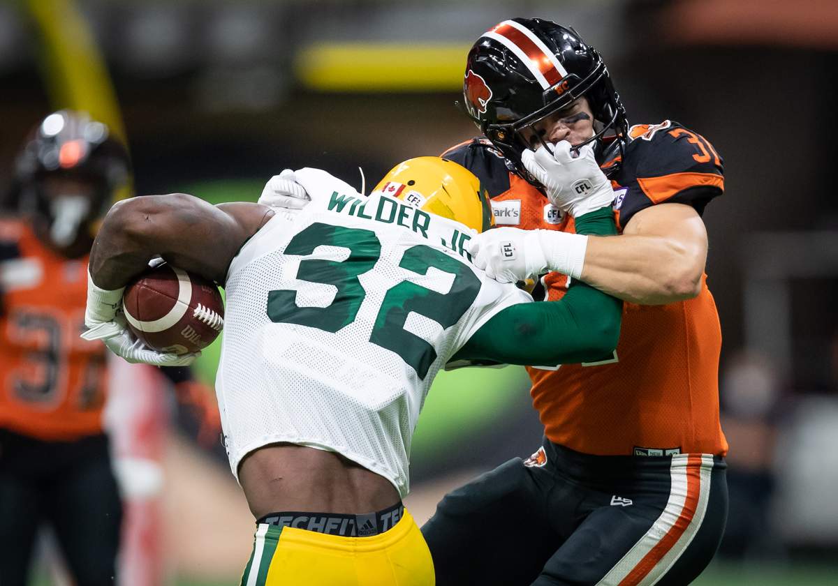 Elks running back James Wilder Jr runs through a tackler