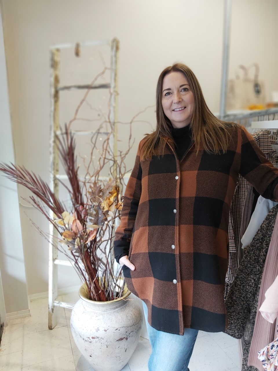 Business owner Lois Chadburn says she's been overwhelmed by community support after she helped a stranger get to a wedding in Hope, B.C. on Fri. Sept. 24, 2021. Chadburn is seen here at her shop, Lolly's Fashion Lounge, in downtown Chilliwack, B.C.