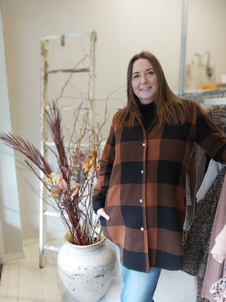 Business owner Lois Chadburn says she's been overwhelmed by community support after she helped a stranger get to a wedding in Hope, B.C. on Fri. Sept. 24, 2021. Chadburn is seen here at her shop, Lolly's Fashion Lounge, in downtown Chilliwack, B.C.