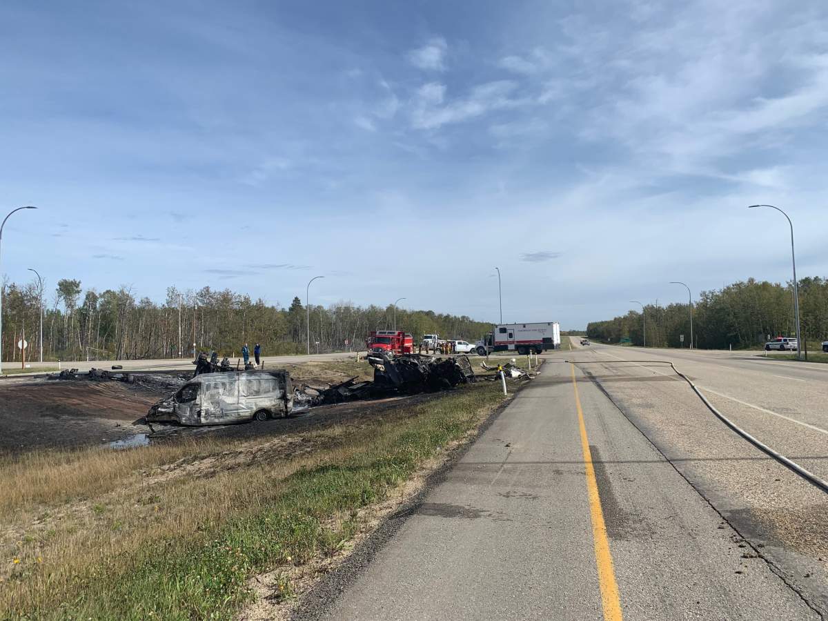 Smoke lingers as investigators determine the cause of a fiery crash that took place on Highway 43 on Sept. 17, 2021.
