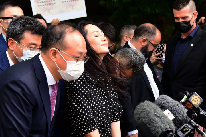 Huawei chief financial officer Meng Wanzhou (C) talks to media at British Columbia Supreme Court after her extradition hearing ended in her favour, in Vancouver British Columbia, Canada on August 18, 2021.