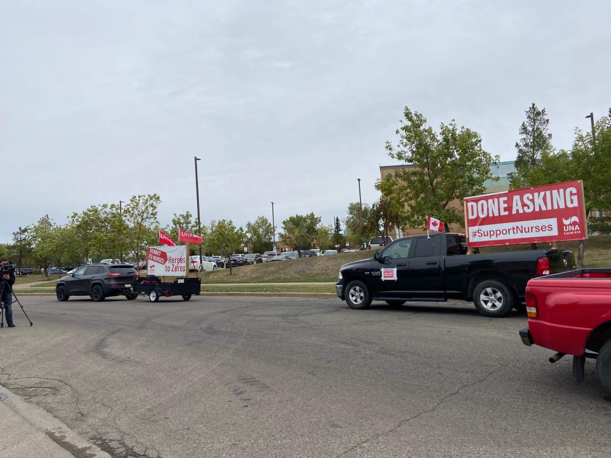 United Nurses of Alberta members drove past Edmonton’s hospitals to protest what they say is a lack of government action to fix staffing shortages in health-care system on Friday, Sept. 17, 2021.