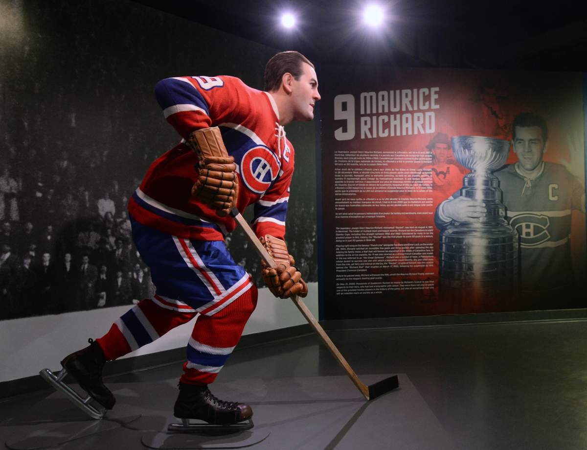MONTREAL, QC - APRIL 10: A wax figure of Maurice ''Rocket'' Richard is inaugurated at the Montreal Canadiens Hall of Fame by Musee Grevin prior to the game between the New York Islanders  and the  Montreal Canadiens on April 10, 2014 at the Bell Centre in Montreal, Quebec, Canada. The wax statue was produced by Musee Grevin to celebrate Richard's life and accomplishments. 