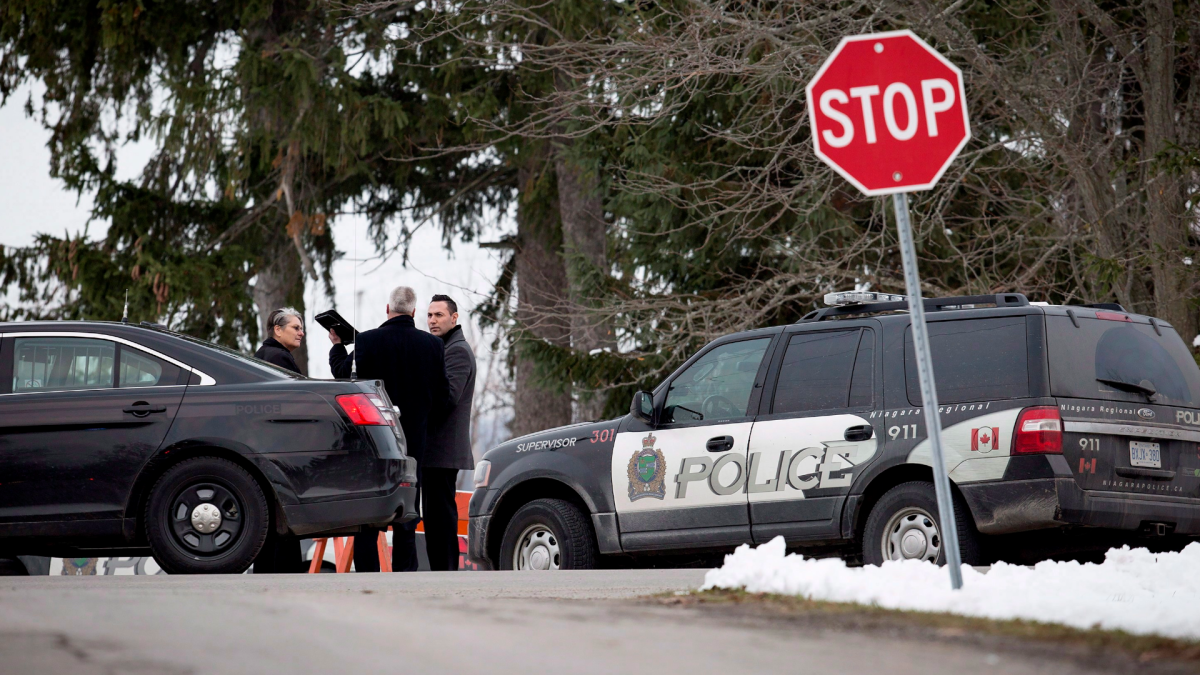 Niagara Regional Police, OPP and the SIU attend a scene near Effingham Street and Roland Road in Pelham, Ont., where a Niagara Regional Police officer was shot by a fellow officer, Thursday, Nov. 29, 2018. THE CANADIAN PRESS/Aaron Lynett .