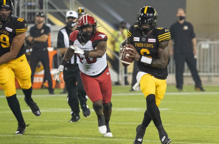 Hamilton Tiger-Cats quarterback David Watford (6) scrambles during first half CFL football game action against the Calgary Stampeders in Hamilton, Ont. on Friday, September 17, 2021. 