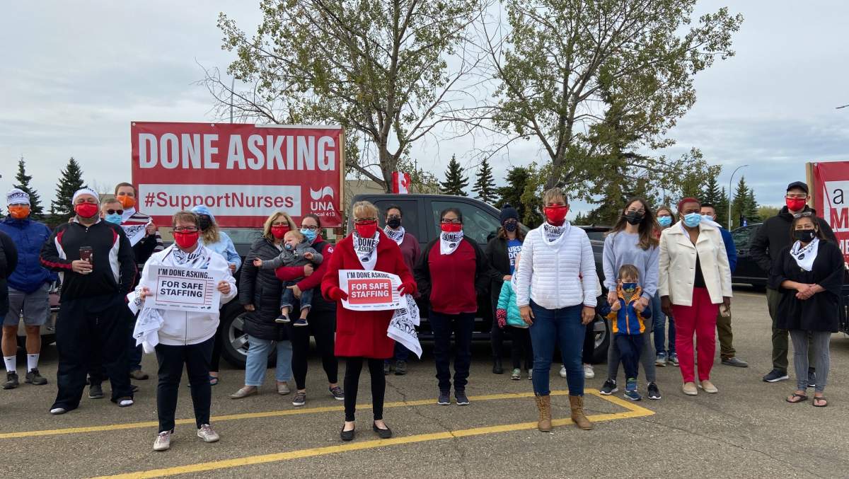 United Nurses of Alberta members drove past Edmonton’s hospitals to protest what they say is a lack of government action to fix staffing shortages in health-care system on Friday, Sept. 17, 2021.