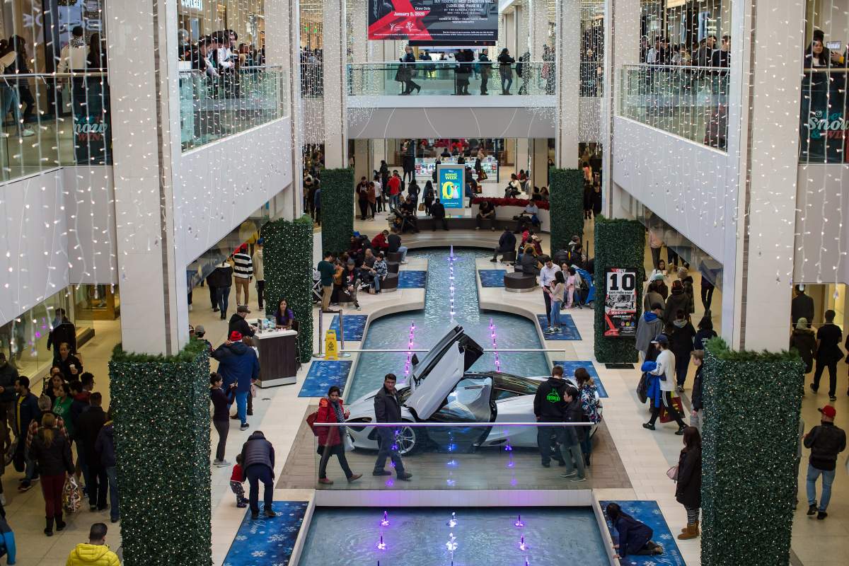Boxing Day shoppers make their way through West Edmonton Mall in Edmonton, Thursday, Dec. 26, 2019.