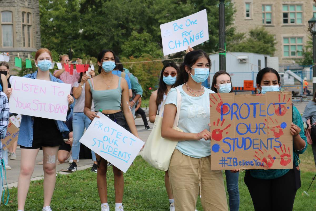 Western Student Holding up a signs during a rally at Western University’s UC Hill against sexual assault and gender based violence. Sept. 17, 2021