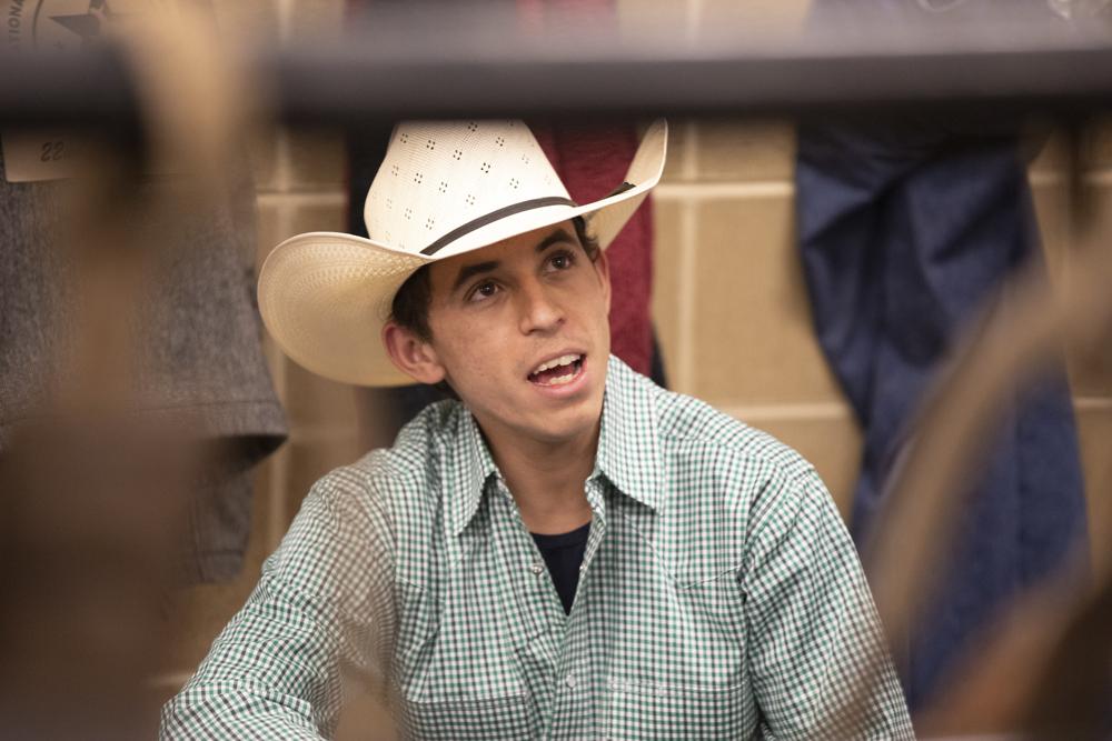 Amadeu Campos Silva, 22, is shown in a locker room in Bangor, Maine, in March, 2020,.