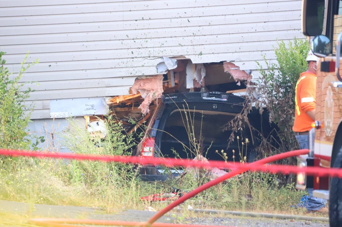 Kingston police are investigating after a Jeep was crashed into a Montreal Street home. Police have closed the road while officials work to extricate the vehicle. 